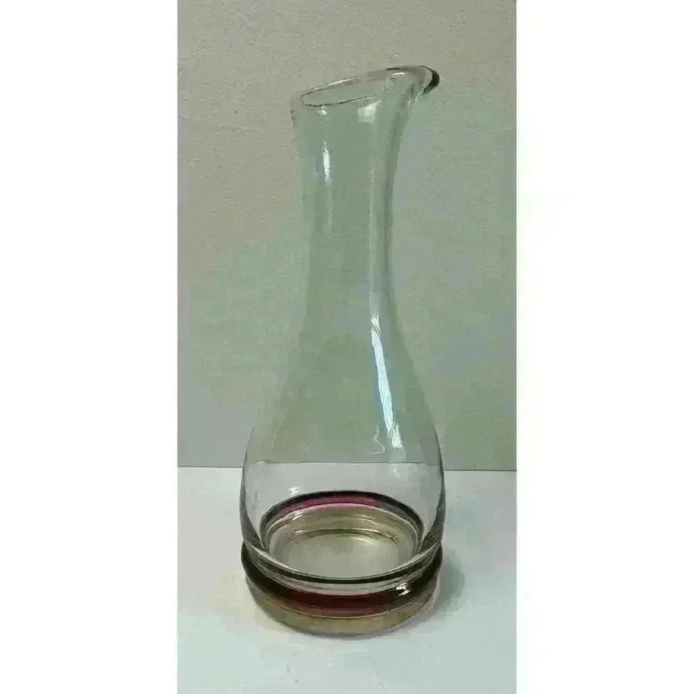 Vintage Glass decanter with cranberry and yellow colored bands on base Beautiful